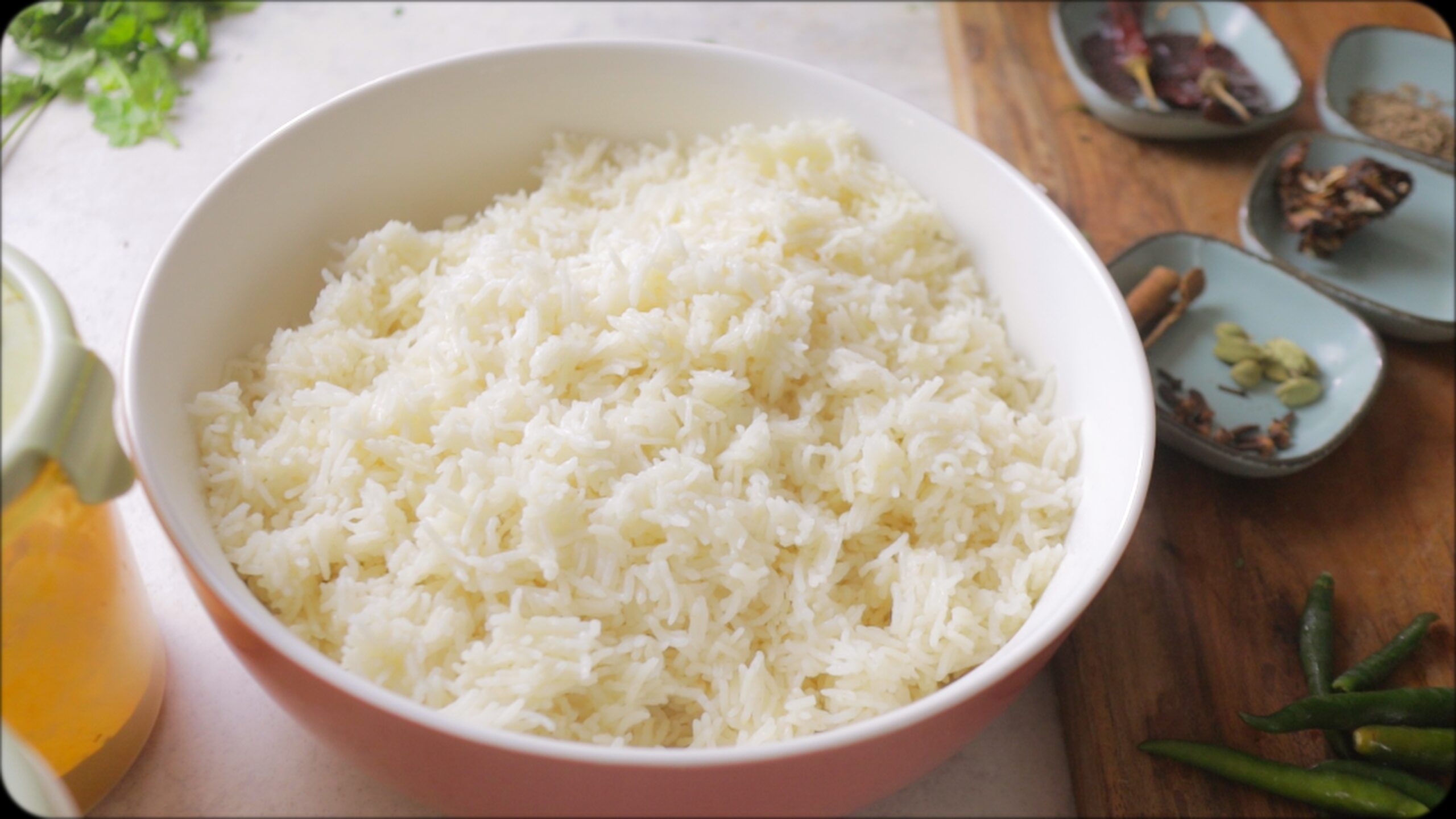 perfectly cooked fluffy basmati rice in a bowl. Ready for making Coriander Rice