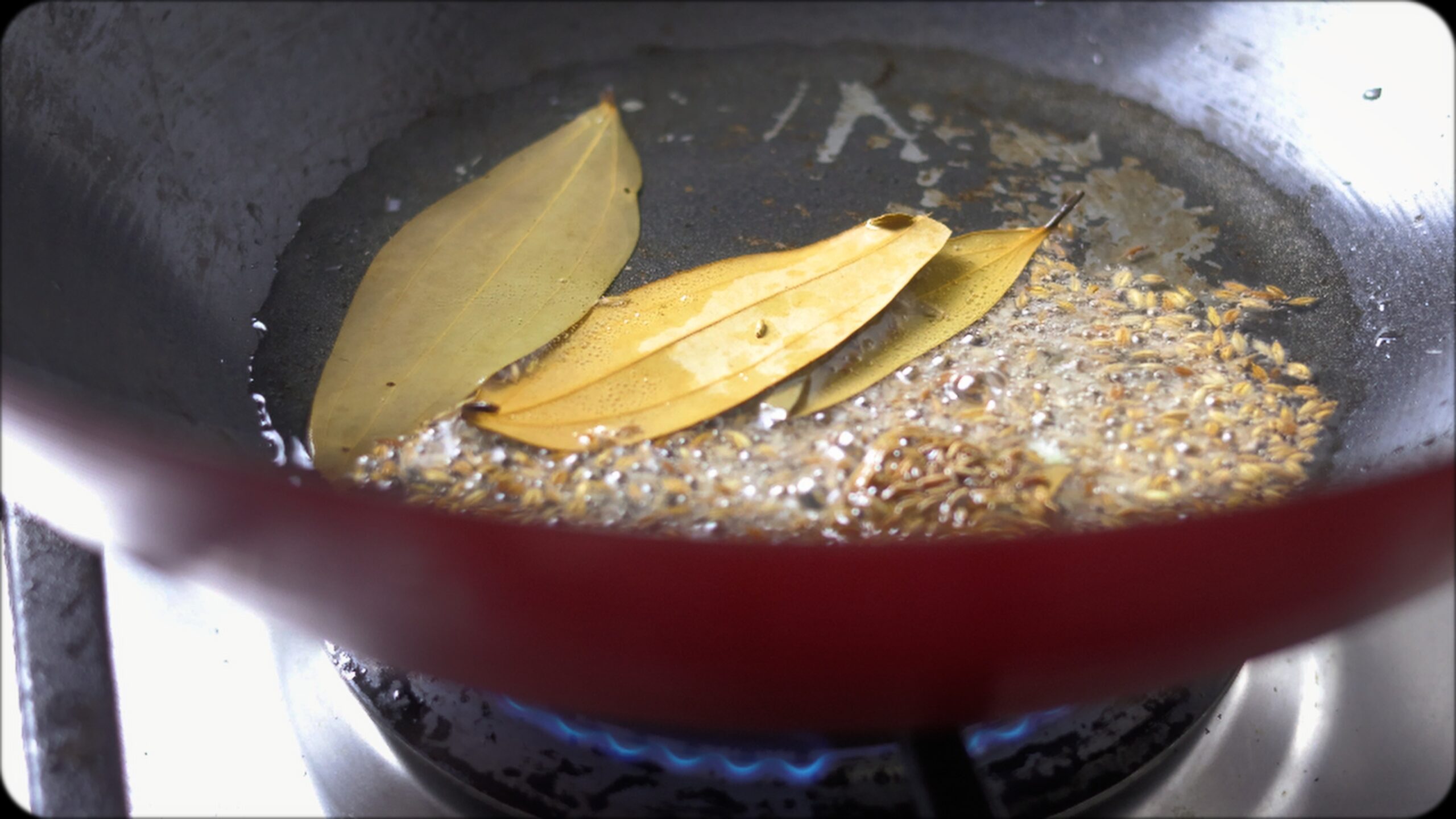 making Coriander rice in a wok