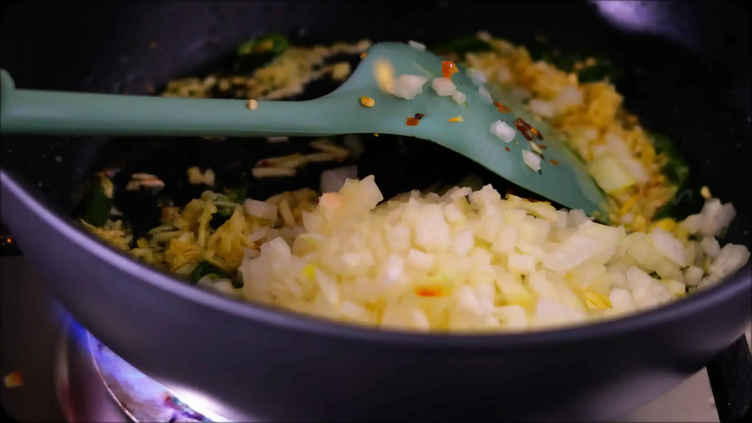 sauteeing onions for making CousCous Fried Rice