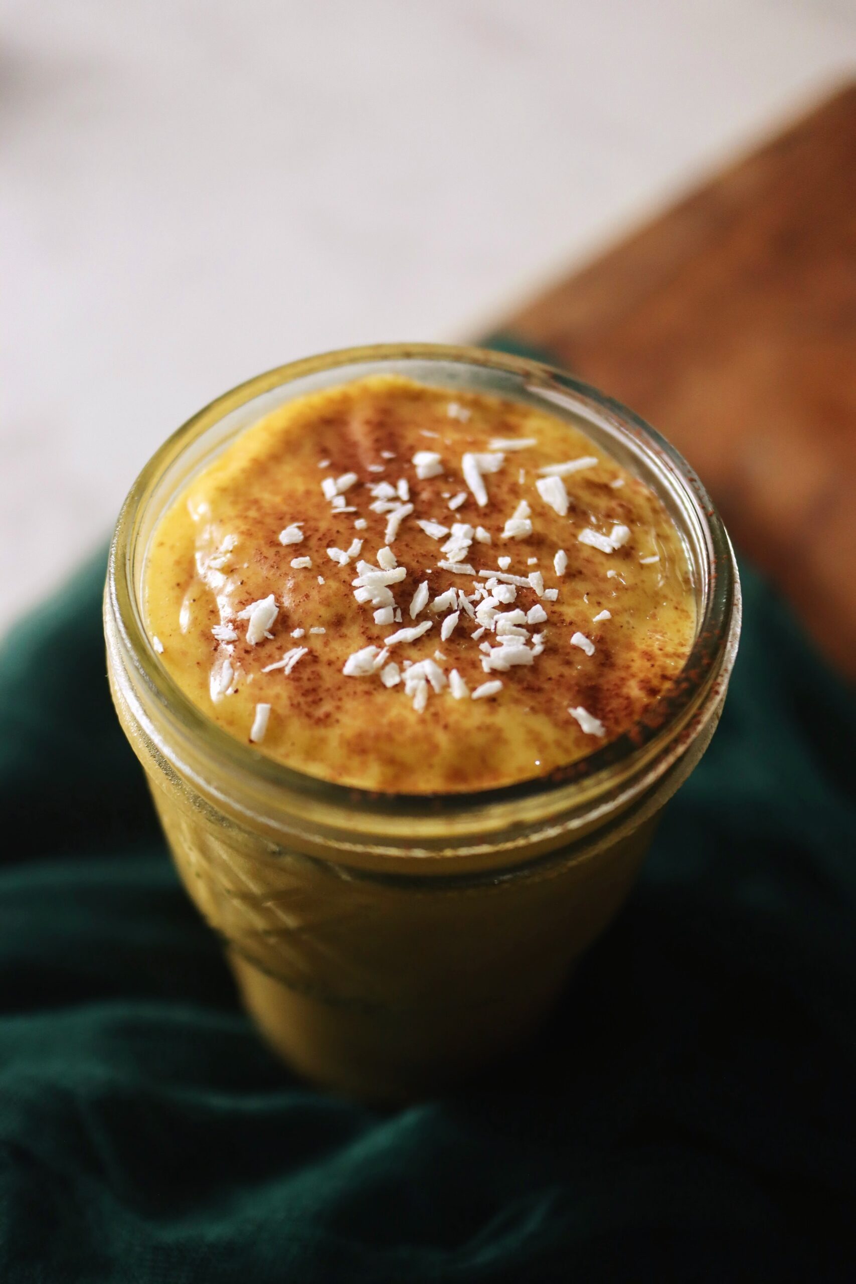 a glass of vegan smoothie with cinnamon and turmeric, Sunshine smoothie recipe