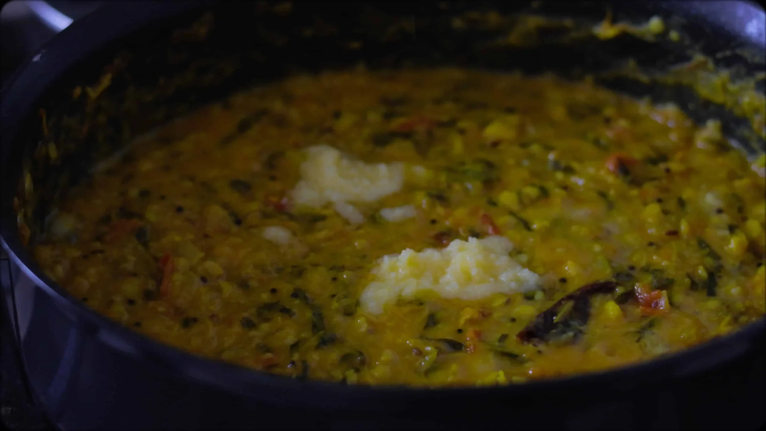 sauteeing with mustard, cumin seeds and red chillies, diced tomatoes, ghee for making methi dal