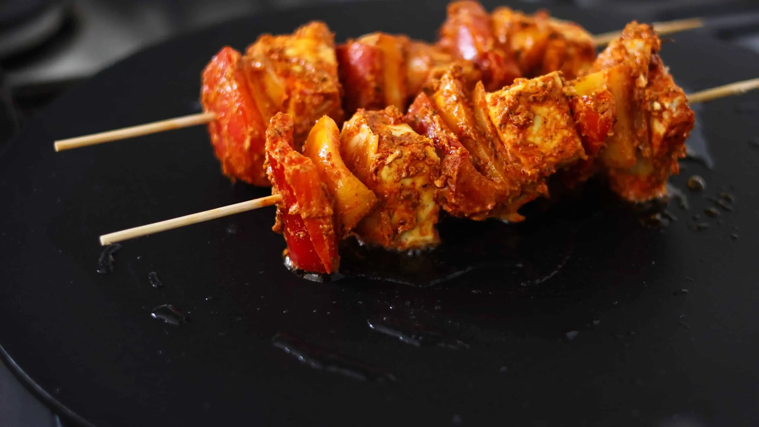 marinade made of hung curd, turmeric, ginger garlic for paneer tikka skewers