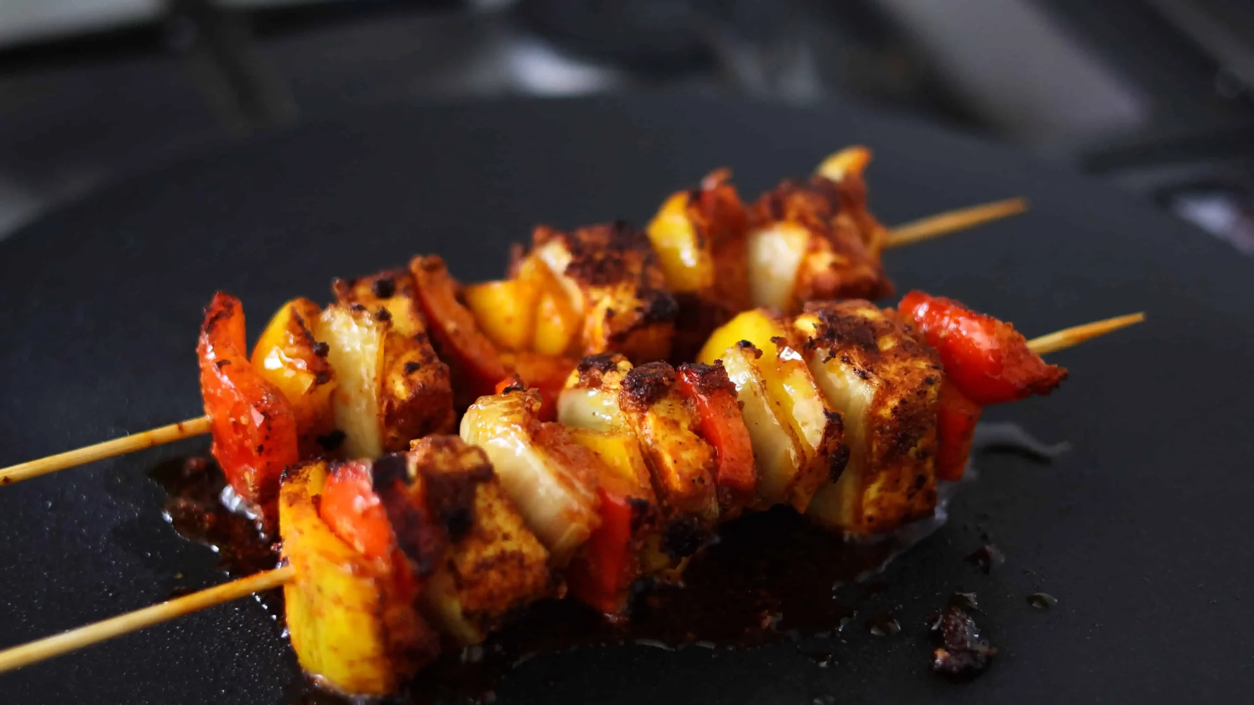 marinade made of hung curd, turmeric, ginger garlic for paneer tikka skewers