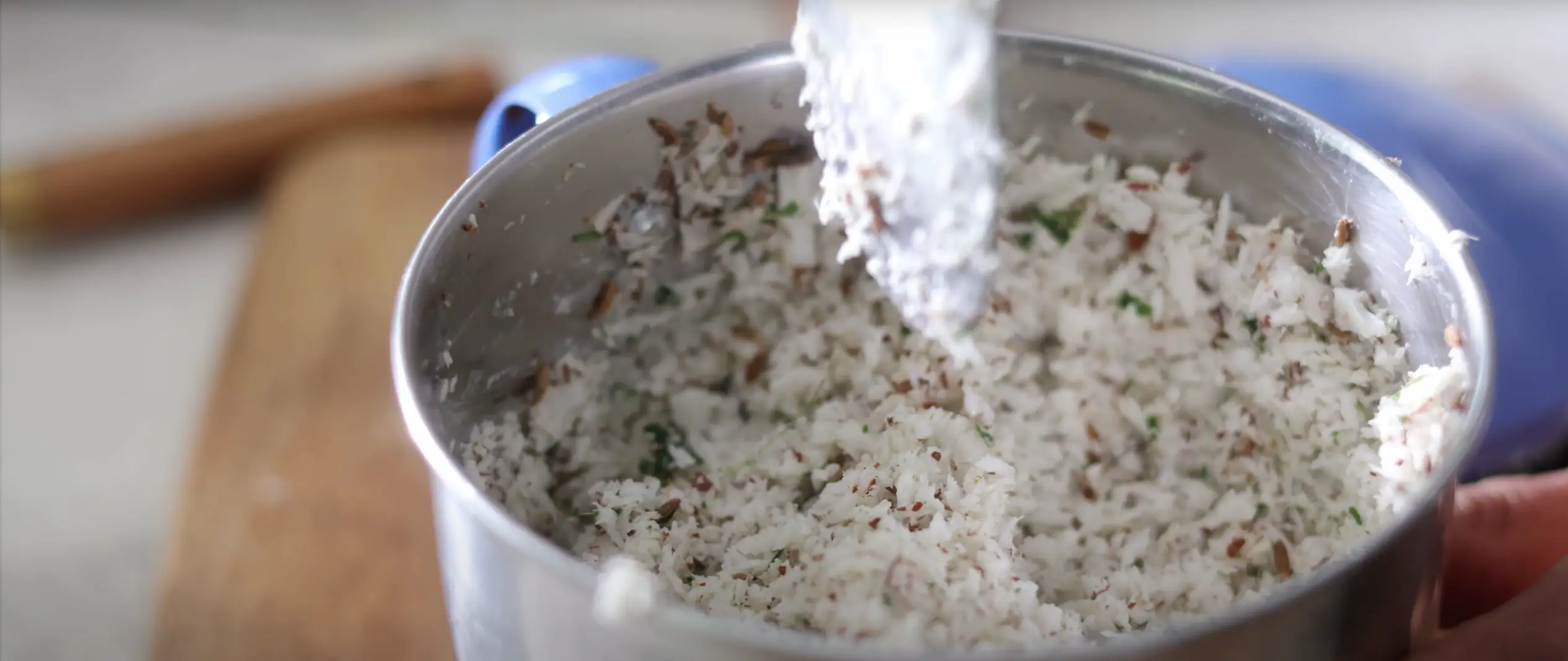 making the coconut masala mix for aratikaya kura recipe