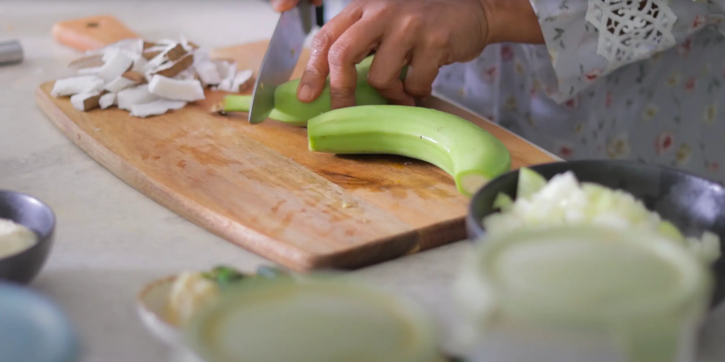 peeling and cutting the raw banana or plantain